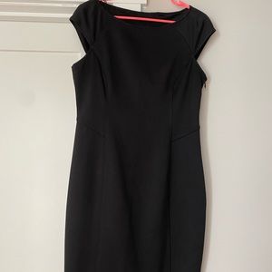 Women’s black dress with back cutouts - size 12